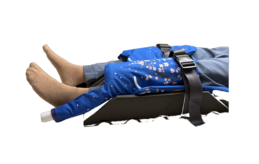 FlexSpace pad & strap supporting a patient's lower legs