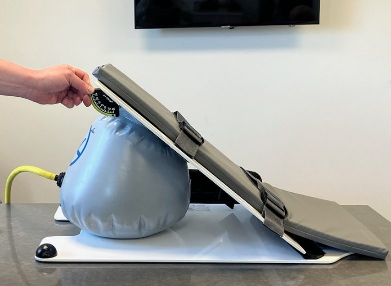 Inclinometer measuring KyphoLift angle on an MRI table