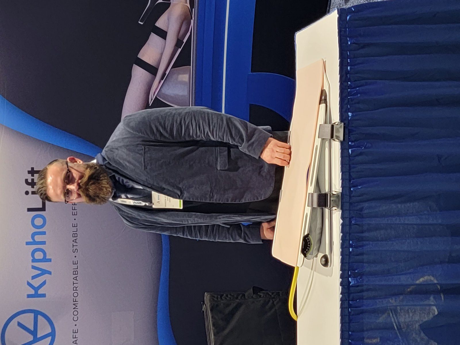 Head coil and KyphoLift on the MRI table at RSNA 2023